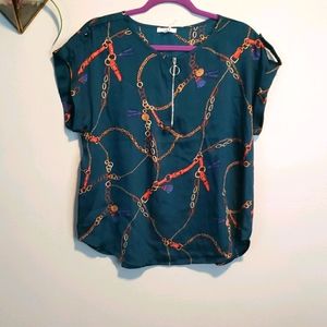 Green top with zipper.